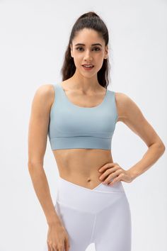 80% Nylon. 20% Spandex Soft. comfortable. skin friendly 4-way stretch. breathable and sweat-wicking Classic U-shape neckline Crisscross straps that offer intricate detailing to your look Featuring non-removable pads for built-in comfort and support Perfect for both sports activities and daily life High Stretch Cross Back Sports Bra With Built-in Padding, High Stretch Tops With Built-in Padding For Pilates, Gym Activewear With Built-in Bra And Wide Straps, High Stretch Yoga Tank Top With Built-in Padding, Compressive Nylon Sleeveless Sports Bra, Supportive Sleeveless Activewear With Built-in Padding, Compressive Sleeveless Nylon Sports Bra, Workout Tops With Built-in Padding And Wide Straps, Sports Activewear With Built-in Padding And Wide Straps