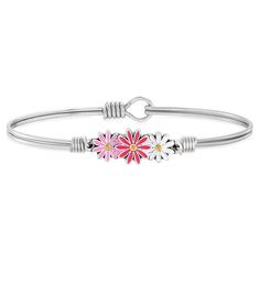 Flower- power pops like never before in our vibrant pink daisy bracelet with a perennial springtime vibe. Each hand- crafted bloom is created with a glossy enamel finish and a yellow crystal in the center for both sweetness and light in one perfect spring bracelet design. Easy hook and catch closure bracelet that measures 6.5 in. | Flower- power pops like never before in our vibrant pink daisy bracelet with a perennial springtime vibe. Each hand- crafted bloom is created with a glossy enamel fin Casual Spring Bangle Jewelry, Spring Flower Hypoallergenic Jewelry, Spring Pink Hypoallergenic Jewelry, Casual Hypoallergenic Jewelry For Spring, Spring Casual Hypoallergenic Jewelry, Casual Hypoallergenic Spring Jewelry, Pink Casual Bracelets For Mother's Day, Casual Pink Bracelets For Mother's Day, Spring Flower Bracelets As A Gift