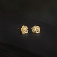 Why We Made This Our Dainty Jasmine Flower Stud Earrings, exquisitely designed to capture the delicate beauty of jasmine blossoms, are a perfect blend of romance and elegance. The delicate design and symbolic meaning of jasmine blossoms make these earrings a thoughtful and stylish addition to any jewelry collection. Whether worn daily or on special occasions, they beautifully convey love, sensuality, and grace. Product Details MADE FROM 925 Sterling Silver with 18K gold coating, Freshwater Pearl Yellow Gold Flower Charm Earrings, Delicate Birth Flower Earrings For Anniversary, Delicate Birth Flower Earrings, 3d Flower Earrings For Anniversary, Elegant Birth Flower Earrings, Elegant Yellow Gold Birth Flower Earrings, Flower-shaped Anniversary Earrings, Elegant Wedding Earrings With Birth Flower, Gold Petal Flower Earrings For Gifts