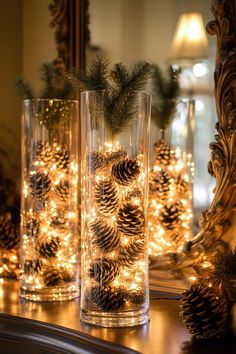 27 DIY Christmas Decor Ideas For Every Room Christmas Vases Decorations Ideas, Indoor Christmas Party Decorations, Xmas Party Table Centerpieces, Christmas Counter Top Decorations, Deco Christmas Table, Christmas Centerpieces With Fairy Lights, Luxury Christmas Centerpieces, Christmas Decorations Glass Vase, Mini Christmas Tree Centerpiece Diy