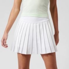 New With Tags! Athleta - Levitate Skort - Size Xxs (Fits Like An Xs) - White - Built In Shorts - Zip Pocket In Back White Tennis Activewear For Spring, White Spring Tennis Activewear, Sporty Golf Bottoms For Spring, Sporty White Tennis Skort, Casual White Skort For Gym, White Moisture-wicking Tennis Skirt, White Stretch Sporty Skort, White Stretch Skort For Gym, White Sports Skort For Spring