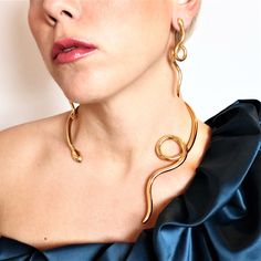 Model : Twisted Single Loose snake necklace Collection: Ofis Metal of Construction: BRASS (or Silver or Gold - upon your instructions) Effect: Gold-plated with lustrous effect Handcrafted in Greece Slightly adjustable size - open for your convenience ++ 2 pcs GOLD-PLATED with Lustrous effect available for immediate dispatch++ The design can also be constructed in gold 14K or 18K (either platinum) ONLY upon request... Price will be advised.- For any questions/inquiries please do not hesitate to a Metal Snake-shaped Jewelry With Adjustable Chain, Party Gold Plated Necklace With Snake Chain, Party Gold-plated Snake Chain Necklace, Party Gold Plated Snake Chain Necklace, Metal Snake Shape Necklace As Gift, Metal Snake-shaped Necklace For Gift, Gold Snake-shaped Jewelry For Party, Snake-shaped Metal Necklace For Gift, Gold Snake-shaped Party Jewelry