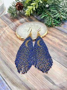 Magical beautiful blue and gold celestial fringe  earrings. Handmade from best Javanese beads. Light weight and great addition to any occasion ✨ Cheap Blue Beaded Fringe Earrings, Blue Beaded Earrings With Gold Beads For Festivals, Pearls Jewelry Diy, Earrings Moon, Beaded Fringe Earrings, Beaded Earring, Beading Crafts, Brick Stitch Pattern, Beaded Earrings Patterns