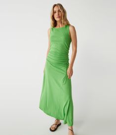 The Perez dress has tank sleeves, flattering side ruching, and an asymmetrical hemline that goes from midi to maxi length. Made from our best-selling Ultra Rib fabric that’s form-fitting and comfortable. Spring Flattering Ruched Maxi Dress, Flattering Ruched Maxi Dress For Spring, Green Midi Dress With Asymmetrical Hem And Ruched Details, Green Midi Dress With Ruched Asymmetrical Hem, Spring Maxi Dresses With Ruched Sides, Spring Asymmetrical Midi Dress With Ruched Sides, Asymmetrical Midi Dress With Ruched Sides For Spring, Flattering Ruched Maxi Dress, Flattering Ruched Summer Maxi Dress