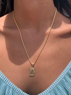 "18kt Gold Filled Initial Charm Necklace Chain Options and Lengths are available below. Chain thickness is between 2-2.5mm. For KIDS: We recommend 16\" For MEN: We recommend 24\" Chain can have a .5\" variation. Please size up if necessary. Top to Bottom: Option 1: Curb Chain Option 2: Rope Chain Option 3: Mariner Link Material: 18 Karat Gold Filled, Hypoallergenic. Tarnish Resistant. Gold-filled does not de-laminate or peel like Gold plated Jewelry nor does it tarnish as readily as silver. Gene Gold Rectangular Pendant Jewelry For Anniversary, Gold Nameplate Jewelry With Box Chain, Rectangular Gold Plated Box Chain Jewelry, Gold Rope Chain Jewelry As A Gift, Personalized Yellow Gold Jewelry With Rectangular Shape, Personalized Yellow Gold Rectangular Jewelry, Gold Rectangular Necklace For Anniversary, Rose Gold Plated Rectangular Jewelry, Personalized Rectangular Gold Jewelry