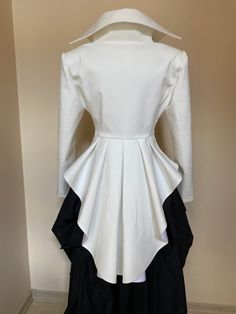 "Fantastic hand tailored formal tuxedo coat with tails. Wide padded shoulders and decorative gold or silver buttons at front The white one is finished with silver buttons, the black one is with gold buttons. If you want to change something, please add a note at the order. The skirt is also available in my shop https://www.etsy.com/listing/1053036939/steampunk-black-taffeta-long-skirtmaxi?ref=shop_home_active_1 SIZE CHART SIZE S - US 6, UK 8, EU 36 bust: bust around 34.5\"/90cm Waist: waist aroun Half Tux Half Dress, White Coat Character Design, Tuxedo Wedding Dress, Fitted Asymmetrical Blazer For Evening, Asymmetrical Fitted Evening Blazer, White Tuxedo-style Party Outerwear, White Tuxedo Style Party Outerwear, Avant-garde Long Sleeve Party Blazer, Tailored Asymmetrical Blazer For Parties