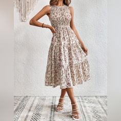 New Boho Floral Smocked Tiered Ruffle Midi Dress * Sleeveless * Stretch Smocked Top * Ruffle Trim Round Neck * High Waist * Tiered Ruffle A Line Flare Skirt * Unlined *Approximate Unstretched Measurements* Small (4) * Bust 27.5"(Up To 35.25") * Waist 25.25"(Up To 27.5") * Length 45.75" Medium (6) * Bust 29"(Up To 37") * Waist 26.75" (Up To 29") * Length 46.5" Large (8/10) * Bust 31.5"(Up To 39.5") * Waist 29" (Up To 31.5")* Length 47.25" Xl (12) * Bust 34" (Up To 41.75") * Waist 31.5"(Up To 34") Sleeveless Smocked Bodice Midi Dress For Garden Party, Sleeveless Midi Dress With Smocked Bodice For Garden Party, Sleeveless Beige Smocked Dress With Ruched Detail, Sleeveless Beige Smocked Dress, Casual Sleeveless Midi Dress With Elastic Neckline, Beige Sleeveless Smocked Dress, Sleeveless Smocked Floral Dress For Beach, Floral Print Sleeveless Smocked Dress For Vacation, Sleeveless Floral Print Smocked Dress For Beach