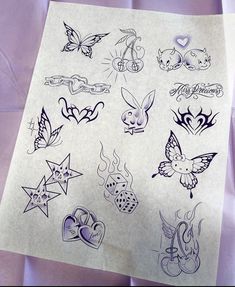 a sheet of paper with tattoos on it