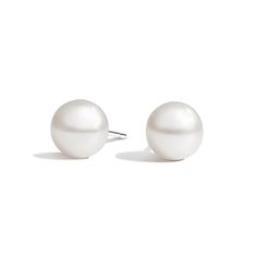 Premium Akoya Cultured Pearl Stud Ears (7mm) - 18K White Gold. A beautifully matched pair of premium Akoya cultured pearls are mounted on classic gold push back posts. These elegant, organic pearls feature brilliant luster and shine with traditional grace and beauty. Refined Round Pearl Earrings As Gift, Refined Round Pearl Earrings For Gift, Classic Pearl White Pearl Earrings For Gift, Refined White Akoya Pearl Earrings, Refined White Pearl Earrings As A Gift, Classic White Gold Earrings With Pearl Charm, Refined White Pearl Earrings For Gift, Classic Round Akoya Pearl Earrings, Classic Akoya Pearl Earrings For Formal Occasions