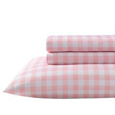 pink gingham checkered sheets and pillowcases on a white background,