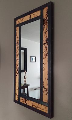 a mirror that is hanging on the wall