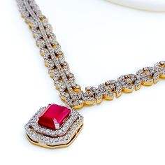 This exquisite 18k yellow gold necklace set, weighing 51.7 grams, features a luxurious design adorned with dazzling diamonds, vibrant rubies, and emeralds. The yellow gold finish enhances its elegant appeal, making it perfect for any special occasion. The set includes a necklace with a total diamond weight of 6.71 carats, featuring F-G color and VS quality diamonds. Ideal for those who appreciate high-quality craftsmanship and timeless beauty, this ruby and emerald diamond set is a cherished add Festive Yellow Gold Diamond Jewelry, Festive Yellow Gold Diamond Bridal Necklace, Traditional Gold Emerald Necklace With Diamonds, Festive Fine Jewelry Diamond Necklace, Luxury Ruby Bridal Necklace, Gold Gemstone Necklace With Cubic Zirconia, Gold Emerald Necklace Hand Set Fine Jewelry, Luxury Ruby Necklaces With Diamond Accents, Luxury Ruby Necklace With Diamond Accents