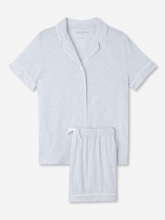 Perfect for lounging in when you get home from work, a good night's sleep and then breakfast round the table in the morning - our blue Ethan jersey shortie pyjamas work effortlessly as a versatile modern take on the classic pyjama. Designed for a flattering but comfortable shape, our women's shortie pyjamas will keep you looking great and feeling comfortable throughout the seasons. The short sleeve jacket top features a fully piped finish in a contrasting white piping for a stylish appearance an Night Clothes Pajamas, Blue Pyjamas, Light Grey Leggings, Dream Wishlist, Sleep Easy, Classic Pajamas, Womens Pajama Shorts, Pyjamas Womens, Christmas Money