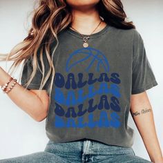 Comfort Colors Dallas Basketball Shirt, Dallas Basketball Sweatshirt, Vintage Style Dallas Basketball shirt, Dallas Basketball fan Gift -Please check Color and Size Charts before placing the order. You can find them in the listing's photos (Depending on what device you are viewing this listing colors may vary slightly). -Returns and exchanges are accepted only if there are defects "No Extra Costs" We create custom t-shirts with great designs for everyone's liking. If you don't find the size or c Gray Fan Apparel Top For Game Day, Gray Fan Apparel Tops For Game Day, Cotton Game Day Top With Text Print, Retro Relaxed Fit Tops For Game Day, Cotton Slogan Tops For Fan Merchandise, Cotton Tops With Text Print For Game Day, Cotton Text Print Tops For Game Day, Relaxed Fit Sports Fan Graphic Tee, Cotton Slogan Top For Fan Apparel