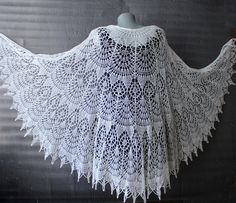 Cream shawl lace Bridal shawl wrap made with soft and cozy merino wool yarn in ivory(cream) color. *Handmade! *Size: lenght is about 35,4'' (90cm) width is about 78,7''(200cm) *Yarn: soft merino wool *Colours: ivory,black and other custom colours available Lightweight hand knitted shawl wrap is versatile item for any season and indispensable accessory for everyday life and for special occasions,is a perfect gift to friends or yourself This shawl has vintage vibe and looks great as a shawl cape with wedding gown in Victorian ,Boho,Gothic styles.You can made your own romantic style with this marvelous shawl! *Washing Instruction: I recommend gently hand wash in lukewarm or cold water with the addition of small amount of wool detergent.Lay flat to dry and block with pins if needed. White Crochet Lace Shawl, Bohemian White Crochet Shawl, White Crochet Lace Shawl One Size, Hand Knitted White Shawl For Wedding, White Hand Knitted Shawl For Wedding, Bohemian Cream Knitted Shawl, White Crochet One-size Shawl, Handmade Cream Shawl One Size, One Size Lace Shawl