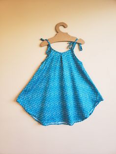 Our tie dress for your little kaikamahine in the cutest, softest fabrics makes this dress versatile for both play and comfort. Easily adjustable ties at the shoulders to accommodate your growing babe. Sizes 2/3T, 4/5T, 6T and 7/8. ‘Ōpua Tie Dress also available for your Pēpē in sizes 6-12m and 12-18m. Newly released in WAHINE NOHO MAUNA, FOREST KUPUKUPU, and BERRY HULUAlso available in KA LĀ ʻULA and ʻŪKIU, the yellow-tinted, sideways rain of Makawao. Aloha Shirt, Gift Card Sale, Tie Dress, Print And Cut, New Shop, The Cutest, Soft Fabrics, Size 2, The Unit