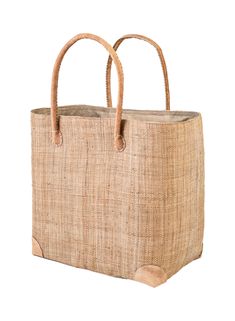 This tote bag is made of premium-grade raffia, a material of natural origin imbued with a summery mood. It comes with a pair of thick braided handles to complete the bohemian look. For durability and sturdiness bottom is lined and has 4 leather corners. Handcrafted bags from the island of Madagascar. 100% handmade using natural resources providing better quality and exquisite details. Its stylish and simple design can definitely make you look more stylish and unique! Perfect size to accommodate Brown Jute Bag With Bamboo Handle, Natural Leather Handles Satchel For Travel, Natural Leather Bag With Bamboo Handle, Natural Leather Bags With Bamboo Handle, Natural Leather Beach Bag With Braided Handles, Natural Leather Crochet Satchel Bag, Natural Leather Crochet Bag With Handles, Natural Leather Handwoven Beach Bag, Leather Crochet Bag With Handles In Natural Color