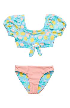 Your little one can squeeze the most fun out of the next beach day in this two-piece with a lemon-print, puff-sleeve top paired with reversible bottoms. UPF 50+ sun protection Bottoms are reversible Lined 80% polyamide, 20% elastane Machine wash, tumble dry Imported Stretch Sets For Summer Playtime, Stretch Playtime Sets For Summer, Summer Swimwear With Short Sleeves For Playtime, Summer Swimming Sets With Short Sleeves, Cute Printed Swimwear For Beach Season, Cute Printed Swimwear For Poolside, Cute Printed Swimwear For Pool, Cute Printed Swimwear For The Pool, Fun Short Sleeve Beach Sets