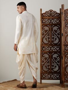 SHRESTHA By VASTRAMAY Men's Cream Mirror Kurta Dhoti And Dupatta Set Experience traditional elegance with the SHRESTHA By VASTRAMAY Men's Cream Mirror Kurta Dhoti And Dupatta Set. Perfect for special occasions, this ensemble blends comfort with classic style, ensuring you stand out effortlessly. Features Elegant cream color Mirror work detailing on kurta Comfortable dhoti with adjustable waistband Matching dupatta included Specifications Brand: SHRESTHA By VASTRAMAY Color: Cream Material: [Speci Cream Mirror, Intricate Mirror, Traditional Mirror, Color Mirror, Traditional Mirrors, Men Cream, Dupatta Set, Cultural Events, Adjustable Waistband