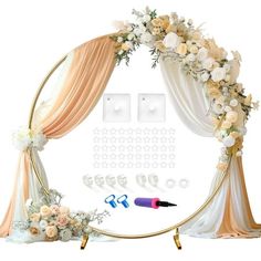 the wedding arch is decorated with flowers and candles