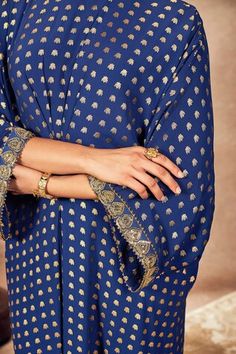 Blue kaftan featuring palmscape printed motifs, embroidered sequined borders, kinari detail, front gathers and side slits. - Aza Fashions Festive Blue Straight Kurta Kaftan, Blue Festive Kaftan Straight Kurta, Festive Blue Kaftan With Dupatta, Festival Blue Kaftan With Dupatta, Blue Kaftan With Dupatta For Festivals, Blue Kaftan With Zari Work For Diwali, Blue Zari Work Kaftan For Diwali, Festive Blue Kaftan With Kimono Sleeves, Festive Motifs Kaftan