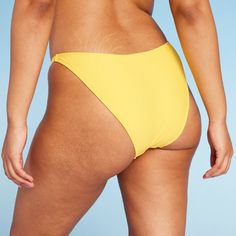 Extra-cheeky bikini bottom from Wild Fable™ in a solid hue. Made from soft fabric with spandex and full lining for stretchy comfort in and out of the water. Opaque construction with low rise and ultra-high leg. If you're not satisfied with any Target Owned Brand item, return it within one year with a receipt for an exchange or a refund. Wild Fable™: A look for every story. Solid Stretch Tankini Brief, Solid Color Stretch Tankini With Briefs, Solid Color Stretch Tankini Brief, Solid Color Stretch Swim Skirt With Brief, Solid Nylon Bottoms For Beach Season, Nylon Solid Color Beach Bottoms, Solid Smoothing Swimwear For Sunbathing, Solid Smoothing Brief Swimwear, Solid Color Smoothing Brief Swimwear