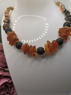 Choker Necklace Amber Lava Shell Beads Elegant Amber Beaded Bracelets With Natural Stones, Elegant Amber Beaded Bracelets With Round Beads, Elegant Amber Beaded Bracelet With Gemstones, Elegant Orange Necklaces With Natural Stones, Handmade Adjustable Amber Necklaces, Handmade Adjustable Baltic Amber Jewelry, Adjustable Amber Beaded Necklace, Amber Round Bead Necklaces For Gifts, Handmade Amber Necklace With Adjustable Fit