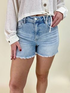 Risen brand light washed high rise denim shorts with a frayed bottom hem. Zip fly Traditional 5 pocket styling Rise: 10.25” Inseam: 3.5” Fabric: 74% Cotton 24% Polyester 2% Spandex Brand: Risen Jeans (RDS6139light) Model is 5’8” and wearing size M Medium Wash Shorts With Frayed Hem, High Rise Washed Blue Shorts With Frayed Hem, Washed Blue High Rise Shorts With Frayed Hem, High Rise Medium Wash Jean Shorts For Spring, Mid-rise Light Wash Shorts With Frayed Hem, Mid-rise Medium Wash Shorts With Frayed Hem, Mid-rise Medium Wash Jean Shorts With Frayed Hem, Mid-rise Jean Shorts With Frayed Hem In Medium Wash, Light Wash Jeans With Frayed Hem