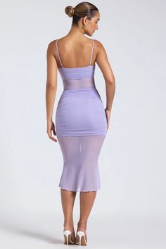 Embrace the allure of illusion with the Alviva midaxi dress. Crafted from premium 20D mesh that sculpts to your curves, its punctuated with sheer jersey panels at the bodice and skirt. Its cut to a fit-and-flare silhouette, framed with a bust-flattering sweetheart neckline and enhanced with ruching at the skirt that creates a cinching wrap-over effect.Sweetheart neck Slender adjustable shoulder straps Ruched detailing Sheer panel detailing Wrap-over effect Concealed side zip fastening Fit-and- Sheer Fitted Bodice Midi Dress, Sheer Midi Length Dress With Fitted Bodice, Sheer Fitted Mesh Maxi Dress, Sleeveless Stretch Mesh Dress, Stretch Sleeveless Mesh Dress, Sleeveless Sheer Polyamide Dresses, Sheer Stretch Polyamide Dress, Fitted Midi Dress With Sheer Bodice For Night Out, Sheer Nylon Bodycon Dress