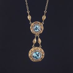 Antique Blue Zircon Necklace: Admire the timeless elegance of this Victorian necklace dating back to 1880, boasting two mesmerizing, round, natural blue zircon stones, approximately 2.75 carats and 1.75 carats. Delicately surrounded by hand-strung natural seed pearls and adorned with hand-set gold leaves, forming a graceful garland design around each stone. Embrace the heavenly allure of this exquisite piece, perfect for adding a touch of vintage sophistication to any ensemble. The paper clip ch Garland Design, Victorian Necklace, Zircon Necklace, Antique Blue, Gilded Age, Gold Leaves, Blue Zircon, Antique Shops, Paper Clip