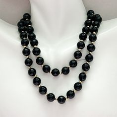 Vintage 14 Karat Gold Onyx Bead Necklace. Gorgeous Black Onyx And Yellow Gold Bead Necklace. Marked 14 Kt. Necklace Is 25 Inches. Onyx Beads Are 8 Mm Diameter, Gold Beads Are 2.5 Mm Diameter. Elegant Black Necklaces With Large Beads, Formal Black Jewelry With Large Beads, Formal Black Necklace With Large Beads, Formal Onyx Beaded Necklace With Round Beads, Formal Onyx Beaded Necklaces With Polished Beads, Formal Onyx Beaded Necklace With Polished Beads, Formal Onyx Round Bead Necklaces, Formal Onyx Necklace With Round Beads, Elegant Double Strand Beaded Necklace With Large Beads