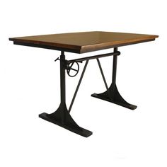 a wooden table with metal legs and an iron base