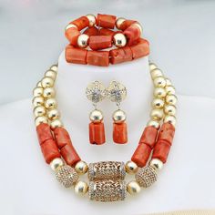 Elevate your Nigerian wedding or party look with this Bead Jewelry. Handcrafted with care, these jewelry pieces add a touch of color and cultural significance to your ensemble, making you stand out with traditional elegance. Orange Beaded Jewelry For Festivals, Traditional Coral Beaded Necklaces With Polished Beads, Traditional Coral Beaded Necklaces, Orange Polished Beads Jewelry For Festivals, Orange Polished Bead Jewelry For Festivals, Orange Jewelry For Festivals, Orange Red Coral Jewelry For Wedding, Elegant Coral Beaded Jewelry, Orange Red Coral Wedding Jewelry