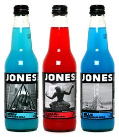 a bottle of juice with the label jones on it's side and an image of a man riding a motorcycle