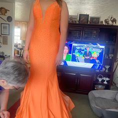 Beautiful Orange Jovani Prom Dress !! Worn Twice. Arms/Sleeves Hemmed, Some Length Taken Off. I’m 5’4 And Normally A 2-4. It Has Some Stretch Orange Prom Dress, Jovani Prom Dress, Orange Prom Dresses, Jovani Prom, Prom Dresses Jovani, Prom Dress Color, Jovani Dresses, Arm Sleeve, Color Orange