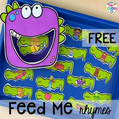 a blue tray with an image of a purple monster and the words feed me rhymes on it