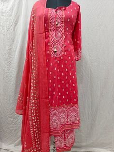 Product Details Pink printed Anarkali style Kurta with Trouser & dupatta Kurta design: Ethnic motifs  * Anarkali shape * Pleated style * Round neck, three-quarter regular sleeves * Sequined detail * Calf length with flared hem * Viscose Rayon fabric Trouser design: *Printed Trouser  *Elasticated waistband * Slip-on closure Material & Care Kurta: Viscose Rayon  Trouser: Viscose Rayon  Dupatta: Cotton Blend  Machine Wash Items Includes: One Piece Kurta One piece Dupatta One Piece Trouser  Note:- Please see the size chart in the image to choose a perfect size. Please feel free to ask any questions regarding this item WE ALSO ACCEPT CUSTOMISATION AS PER CUSTOMER REQUESTS. Traditional Long Kurta With Printed Motifs, Semi-stitched Bandhani Print Salwar Kameez, Semi-stitched Mulmul Palazzo Set For Diwali, Traditional Chanderi Palazzo Set With Bandhani Print, Unstitched Chanderi Sharara With Bandhani Print, Festive Designer Bandhani Salwar Kameez, Bollywood Style Designer Bandhani Print Salwar Kameez, Traditional Bandhani Print Palazzo Set For Designer Wear, Semi-stitched Chanderi Sharara With Bandhani Print