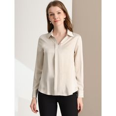 The smooth, soft, and minimalist design updates this collared no-buttons shirt for understated charm. This seriously chic long-sleeve shirt is the perfect way to elegantly elevate any outfit. This simple shirt is an elegant take on a wardrobe classic, featuring a stylish v-neckline. The charm of women is shown perfectly at this moment. In a red smooth fabric, this can be styled up or down whatever the occasion. Just tuck the front into black or white pants for an office day. Elegant Office Blouse With Placket Detail, Elegant Office Blouse With Placket, Elegant Office Shirt With Placket, Sleek Solid Color Collared Tops, Elegant Business Blouse With Placket, Chic Solid Blouse With Collared Neckline, Chic Solid Color Blouse With Collared Neckline, Elegant Solid Color Office Shirt, Business Casual Spread Collar Blouse