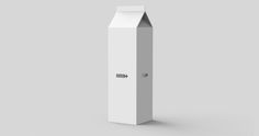 an empty milk carton on a gray background