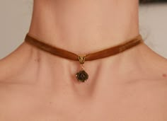 Bronze rose beige velvet ribbon choker Choker -necklace with beige velvet ribbon and charm- bronze rose. Flower's dia 15-17 mm Length of choker is adjustable: 28-33 cm/11-13 inch or 33-38 cm/13-15 inch or 14-16 inch/ 35.5 cm-40.6 cm Width of ribbon 10 mm / 0.4 inch If you need other length of necklace let me know and I will make it for you. ♥All my jewelry come in boxes or bags . If you are purchasing a gift I am happy to include personalised messages with your order. Please leave a note of desi Polymer Clay Choker, Adjustable Rose Gold Choker, Rose Gold Choker For Gift, Clay Charm Necklace, Ribbon Choker Necklace, Rose Choker, Velvet Necklace, Blue Choker, Polymer Clay Flower Jewelry