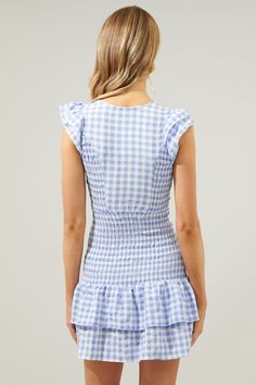 Go gingham in this perfectly smocked detail mini dress. Ruffle layer cap sleeves frame a V neckline and partially smocked bodice with princess seams to add a shapely figure. Smocking continues throughout the drop waist and ruffle layer details to finish off the dress. Pair it with pointed toe heels and a mini shoulder bag for a charming ensemble.- Ruffle layer details- Smocked- Princess seams- Drop waist- Comes in 2 ColorsSize + Fit - Model is 5'8" and wearing size XS- Measurements taken from si Gingham Dress With Ruffle Hem And Square Neck, Gingham Short Sleeve Dress With Smocked Bodice, Gingham Mini Dress With Ruffles And Square Neck, Gingham Dress With Smocked Bodice And Short Sleeves, Short Sleeve Gingham Dress With Smocked Bodice, Summer Plaid Smocked Dress With Ruffles, Gingham Dress With Ruffled Hem And Straps, Summer Gingham Smocked Dress With Smocked Back, Spring Gingham Mini Dress With Ruffle Hem