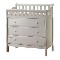 a white baby crib with three drawers on the bottom and one drawer below it