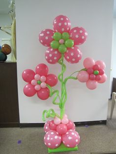 balloon flowers in a vase on the floor