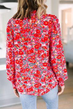 We can't change this blouse nor would we want to! It's gorgeous! That floral print is so vibrant and feminine! This blouse also has a very classic fit that we can't get over! You are going to love wearing this beauty for a day at work or for grabbing lunch with a friend! This blouse features a round neckline, long sleeves, and a floral print. Material has no amount of stretch.Cam is wearing the small. Multicolor Feminine Blouse With Ditsy Floral Print, Feminine Floral Print Patterned Top, Vibrant Red Tops For Fall, Feminine Multicolor Floral Print Blouse, Vibrant Red Top For Fall, Multicolor Ditsy Floral Print Blouse For Day Out, Fall Ditsy Floral Print Blouse, Spring Floral Print Patterned Blouse, Chic Floral Print Patterned Blouse