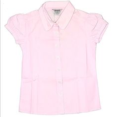 New With Tags Pink Dress Shirt For Girls Size 6-8. Closure Type: Button Sleeve Type: Short Puff Sleeve Material Composition: Cotton/Polyester Oxford Fabric Color: Pink Features:Classical School Uniform Design, Puff Sleeve, Casual, Solid Color, Well Match Girl's Poodle Skirt More Details: Plastic Buttons, Cotton Blend, Contrast Binding Around Neck, Garment Wash Washing And Ironing : Wash With Dark Colors, Gentle Machine Or Hand Wash, Do Not Tumble Dry, Do Not Iron, Do Not Dry Clean. Preppy Pink Tops For School, Preppy Pink Top For School, Cute Pink Tops For School, Pink Summer School Tops, Cute Pink Collared Top, Spring Tops For School, Cute Pink Collared Blouse, Preppy Pink Short Sleeve Shirt, Fitted Tops With Buttons For Playtime