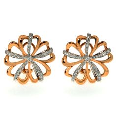 This gorgeous pair of estate earrings is finely crafted in solid 18k rose and white gold, made in the shape of beautiful flowers. The total diamond weight for the pair is 0.78 carats of VVS clarity and G color. Each earring measures 27mm. The earrings are equipped with very popular and secure Omega backs. The pair weighs 14.40 grams. The original box and certificate are included. Luca Carati Two Tone Diamond Flower Earrings 18K Rose & White Gold 0.78Cttw This gorgeous pair of estate earrings is finely crafted in solid 18k rose and white gold, made in the shape of beautiful flowers. The total diamond weight for the pair is 0.78 carats of VVS clarity and G color. Each earring measures 27mm. The earrings are equipped with very popular and secure Omega backs. The pair weighs 14.40 grams. The o Diamond Flower Earrings, Diamond Flower, Fine Jewellery Earrings, Flower Earrings, White Gold Diamonds, Or Rose, Clip On Earrings, Gold Diamond, Beautiful Flowers