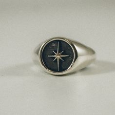 A solid North Star signet ring. This celestial piece of handcrafted jewelry is made with 925 recycled silver and is perfect for your everyday stack of adornments. -------- The Grit Trade Co. collection is small-batch / woman-made in Nashville, TN. Using the investment casting method, each piece is 3D printed, cleaned, sprued, poured, burned out, cast in recycled sterling silver, sanded, polished and tumbled twice. You'll find a .925 sterling silver stamp and GRIT makers mark on each piece. *Plea Celestial Ring, Mens Rings Fashion, Signet Rings, Silver Signet Ring, Dope Jewelry, Funky Jewelry, Jewelry Lookbook, Ring Minimalist, Star Ring