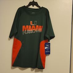 Nwt: Proedge University Of Miami Hurricanes Shirt Size: M 8/10 Color: Green And Orange Smoke Free And Pet Free Home Orange Crew Neck Top For Sports Season, Sporty Tops For School Sports Season, Orange Team Spirit Tops For Sports Events, Orange Tops For Sports Events With Team Spirit, Sporty Green Tops For Fan Gear, Orange Crew Neck Top For Sports Events, Orange Team Spirit Sports Top, Green Short Sleeve Top With Team Logo, Orange Tops For Game Day With School Spirit