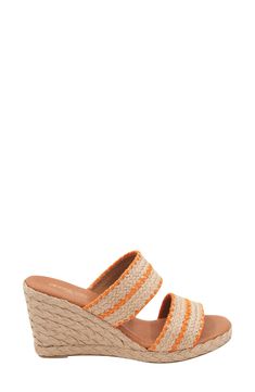 Woven raffia creates a boho aesthetic on an espadrille-inspired slide sandal lofted by a subtle platform and wedge heel. 3" heel; 1/2" platform Cushioned footbed Textile upper/leather lining and sole Made in Spain Casual Orange Platform Wedge Sandals, Orange Open Toe Wedge Sandals For Spring, Spring Orange Open Toe Wedge Sandals, Orange Slip-on Wedge Sandals For Beach, Orange Slip-on Wedge Sandals For Spring, Orange Platform Wedge Sandals For Spring, Orange Wedge Sandals For Summer, Spring Orange Platform Wedge Sandals, Summer Platform Orange Sandals