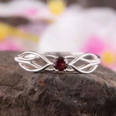 "Engagement ring, Garnet ring, Silver promise ring, Celtic ring, Art deco ring, Unique silver ring, Garnet jewelry, January birthstone WE OFFER UNLIMITED PERIOD INSTALLMENTS PLAN This is a beautiful, stunning, feminine ring that works well for all occasions, styles, and ages. You will love it! Ring information Stone: Garnet Approximate size: 3.5mm Metal type: Silver Metal stamp: 925 Sterling SIlver Customization / Replacements It's easy to create jewelry that's perfect for you. Change the materi Rings Pandora, White Stone Ring, Silver Promise Rings, Garnet Ring Silver, Unique Silver Rings, Antique Style Rings, Celtic Ring, Celtic Wedding Rings, Celtic Rings